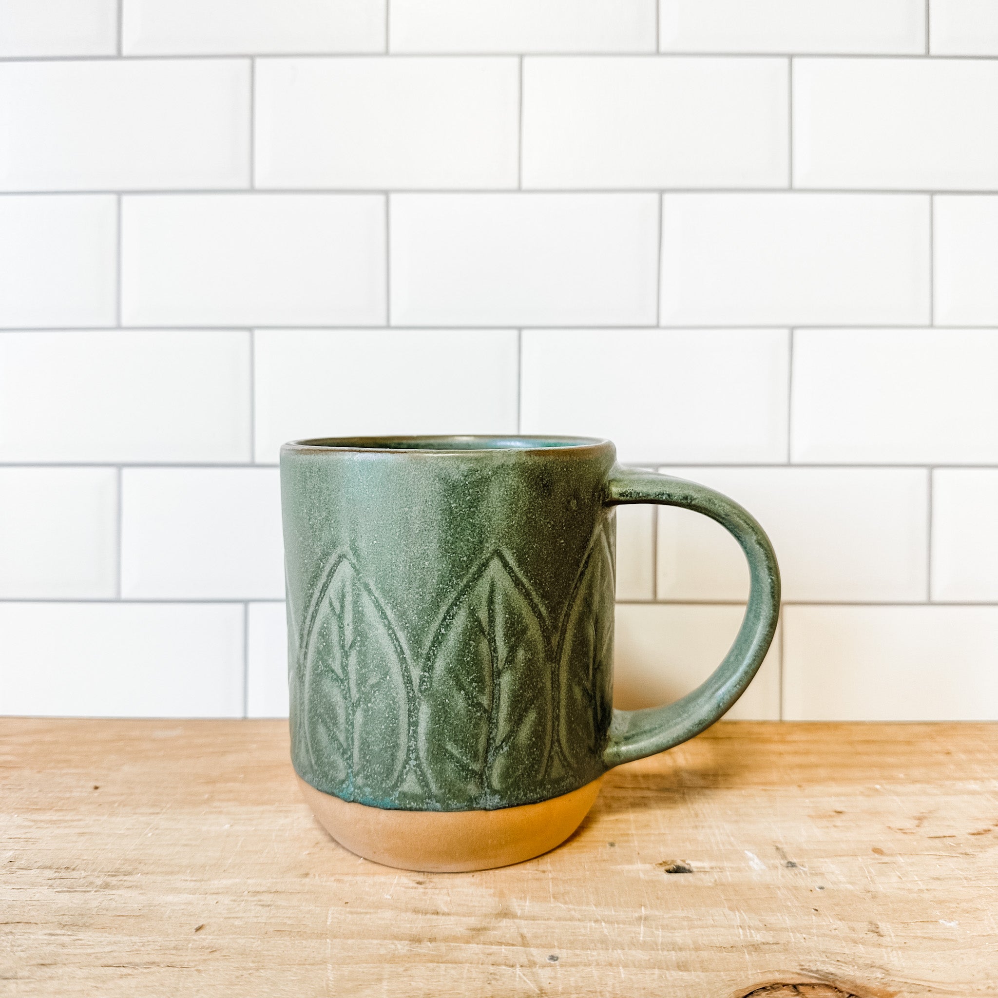 Debossed Stoneware Mug, Reactive Glaze